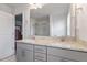 Elegant bathroom featuring a double vanity with granite countertops and modern fixtures at 1123 Latitude Dr, Durham, NC 27713