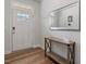Bright foyer with wood floors and modern decor at 1123 Latitude Dr, Durham, NC 27713