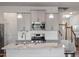 Stylish kitchen features granite countertops, stainless steel appliances and island at 1123 Latitude Dr, Durham, NC 27713