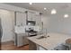 Lovely kitchen with a large island and modern stainless steel appliances at 1123 Latitude Dr, Durham, NC 27713