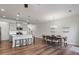 Spacious living area with kitchen, dining, and seating, ideal for entertaining at 1123 Latitude Dr, Durham, NC 27713