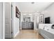 Bathroom features a soaking tub, walk-in shower, double vanity, and modern fixtures, creating a luxurious retreat at 115 Cliffview Dr, Garner, NC 27529
