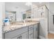 Bathroom features a double vanity with granite countertops and modern fixtures, offering both style and functionality at 115 Cliffview Dr, Garner, NC 27529