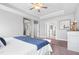 The bedroom features a trey ceiling, and neutral decor, creating a peaceful ambiance for rest and relaxation at 115 Cliffview Dr, Garner, NC 27529