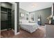 Cozy bedroom features neutral colors, natural light, and a closet creating a relaxing and inviting space at 115 Cliffview Dr, Garner, NC 27529