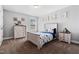 Bright bedroom featuring a dinosaur themed bed set and neutral walls at 115 Cliffview Dr, Garner, NC 27529