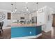 Bright kitchen with island, granite countertops, stainless steel appliances, and ample cabinet space at 115 Cliffview Dr, Garner, NC 27529