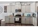 Stylish kitchen with stainless steel appliances and granite countertops at 115 Cliffview Dr, Garner, NC 27529