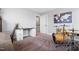 Versatile room featuring a desk, drum set, and natural light at 115 Cliffview Dr, Garner, NC 27529