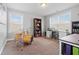 Versatile room featuring two bright windows, and a drum set at 115 Cliffview Dr, Garner, NC 27529
