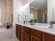 Bathroom featuring a dual sink vanity, soaking tub, and walk-in shower at 11619 John Allen Road Rd, Raleigh, NC 27614