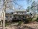 View of the back of the home with a large deck and spacious yard at 11619 John Allen Road Rd, Raleigh, NC 27614