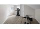 This is a home gym with a treadmill, free weights and a weight bench at 1210 Poplar Forest Lane Ln, Pittsboro, NC 27312