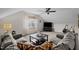 Inviting living room featuring comfortable seating, a large window, and a stylish coffee table, great for relaxation at 1210 Poplar Forest Lane Ln, Pittsboro, NC 27312