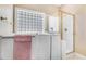 This bright bathroom features a walk-in shower and separate jacuzzi bathtub at 129 Bennett Pl, Clayton, NC 27527