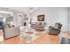 Bright and spacious living room features hardwood floors, fireplace, and cozy furniture at 129 Bennett Pl, Clayton, NC 27527