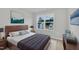 Inviting bedroom with a wood bed frame, a large window, and wood nightstands creates a cozy retreat at 1434 Rosepine Dr, Cary, NC 27519