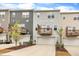 Attractive townhome exteriors showcasing garages, balconies, neutral siding, and landscaping at 1434 Rosepine Dr, Cary, NC 27519