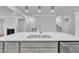 Spacious kitchen island with sink, stainless steel fixtures, and pendant lighting at 1434 Rosepine Dr, Cary, NC 27519