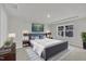 Comfortable main bedroom with a gray bed frame, soft rug, and serene decor at 1434 Rosepine Dr, Cary, NC 27519
