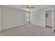 Bedroom featuring carpeted floor, a ceiling fan, and bright natural light at 147 Tralee Dr, Smithfield, NC 27577