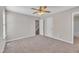 Bedroom with neutral carpet, access to stairs and an attached bathroom at 147 Tralee Dr, Smithfield, NC 27577