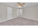 Bedroom featuring a ceiling fan, window with blinds, and neutral carpet at 147 Tralee Dr, Smithfield, NC 27577