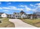Quaint single-Gathering home with a long driveway and a well-kept lawn in a quiet neighborhood at 147 Tralee Dr, Smithfield, NC 27577
