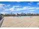 Spacious community pool with a mushroom water feature and ample deck space on a sunny day at 147 Tralee Dr, Smithfield, NC 27577