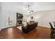 Inviting living room features a stone fireplace, hardwood floors, and recessed lighting at 153 Brindley Cir, Clayton, NC 27520