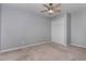Simple bedroom features carpet, and a ceiling fan at 1603 Stonegate S, Sanford, NC 27332
