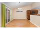 Dining area features a modern chandelier and sliding glass doors to outdoor space at 1603 Stonegate S, Sanford, NC 27332
