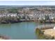 Panoramic view of a neighborhood next to a scenic lake and wooded areas at 1628 Highpoint St, Wake Forest, NC 27587