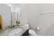 Neutral bathroom showcasing granite countertop and modern fixtures at 1628 Highpoint St, Wake Forest, NC 27587