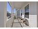 Charming front porch with two chairs, offering a relaxing outdoor space at 1628 Highpoint St, Wake Forest, NC 27587