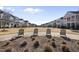 Charming neighborhood with manicured lawns and cozy seating areas for relaxing outdoors at 1628 Highpoint St, Wake Forest, NC 27587
