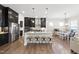 Modern kitchen with stainless steel appliances, granite countertops, and a center island with seating at 1628 Highpoint St, Wake Forest, NC 27587