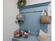 Functional mudroom with hooks, storage baskets, and a built-in bench at 1628 Highpoint St, Wake Forest, NC 27587
