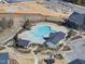 Aerial view of the community pool featuring a unique shape and gathering area at 1628 Highpoint St, Wake Forest, NC 27587