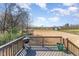 Deck overlooking a large grassy backyard, perfect for outdoor relaxation and entertainment at 197 S Clearbook Ct, Angier, NC 27501