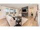 Bright living room with fireplace, mantel, and large windows with lots of natural light at 197 S Clearbook Ct, Angier, NC 27501