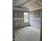 Unfinished bedroom with a window allowing natural light to fill the space at 200 Dove Rd, Cameron, NC 28326