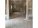 Spacious living room with unfinished walls and flooring, an archway and a view to another room at 200 Dove Rd, Cameron, NC 28326