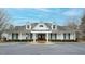 Community clubhouse featuring a charming facade, and well manicured lawn at 2524 Forest Shadows Ln, Raleigh, NC 27614