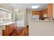 Functional laundry area with modern appliances, built-in cabinets and folding counter at 2524 Forest Shadows Ln, Raleigh, NC 27614