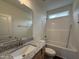 Bathroom featuring a granite countertop, vanity and a shower-tub combination at 274 Longbow Dr, Middlesex, NC 27557