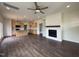 Spacious open-concept featuring a kitchen and living room with fireplace at 274 Longbow Dr, Middlesex, NC 27557