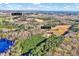 Identified parcels at 290 and 252 Collie Road, showcasing a mix of open land and dense woodlands at 290 Collie Rd, Castalia, NC 27816