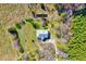 Aerial image of a private lot at 252 Collie Rd, featuring a modest home set amidst verdant greenery at 290 Collie Rd, Castalia, NC 27816