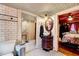 Bathroom with a unique patterned floor, vintage style sink, and a glass door shower at 290 Collie Rd, Castalia, NC 27816